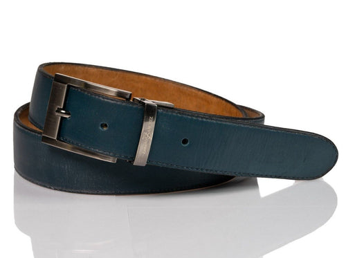 Hand made blue leather belts  The Zapato Sanchez monogram is imprinted in its metalic buckle matching the blue leather in this belt introduced for Spring 2021. The blue stitching completes the accessory.  Blue supreme blue leather with a tan coloured lining Metalic-toned hardware Belts are 1.5 inches wide and are measured from the end of the buckle to the center hole. Sizing may differ based on where the belt is worn (at the hips vs on the waist)  1.3/8 inches. Made in Canada