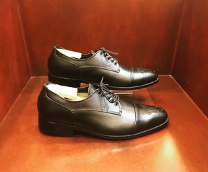 The black Javier, brogue toe comes in  black cow leather It is hand-crafted which makes each pair unique. These men`s shoes feature a natural leather lining And a blake-stitched leather outsole. Distinguished by its elegant, elongated shape, this lace-up is a testament to Zapato Sanchez's shoemaking craftsmanship.   Last number 9807.  All designer shoe patterns by Zapato Sanchez are traced to Italy and come in European shoe sizes. 