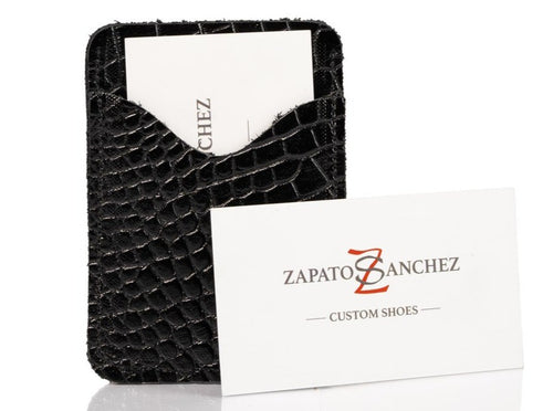 Hand made men's leather slim wallet built for style & utility. It has 2 discrete pockets.  Zapato Sanchez men's wallets will fit up to 10 cards, but once additional cards are added, the leather will conform to the extra cards added. But keep in mind, that once the leather stretches to conform to the cards, the leather will not return to its original shape.   Crafted in Canada at West Edmonton Mall, this everyday companion is a great gift for the man who appreciates and understated elegance.