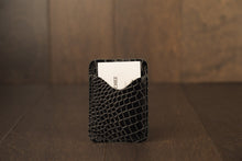 Load image into Gallery viewer, Hand made men&#39;s leather slim wallet built for style &amp; utility. It has 2 discrete pockets.  Zapato Sanchez men&#39;s wallets will fit up to 10 cards, but once additional cards are added, the leather will conform to the extra cards added. But keep in mind, that once the leather stretches to conform to the cards, the leather will not return to its original shape.   Crafted in Canada at West Edmonton Mall, this everyday companion is a great gift for the man who appreciates and understated elegance.
