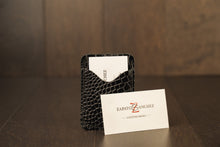 Load image into Gallery viewer, Hand made men&#39;s leather slim wallet built for style &amp; utility. It has 2 discrete pockets.  Zapato Sanchez men&#39;s wallets will fit up to 10 cards, but once additional cards are added, the leather will conform to the extra cards added. But keep in mind, that once the leather stretches to conform to the cards, the leather will not return to its original shape.   Crafted in Canada at West Edmonton Mall, this everyday companion is a great gift for the man who appreciates and understated elegance.
